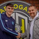 Harrogate Town's newest recruit, Tom Cursons, is welcomed by manager Simon Weaver after joining the League Two outfit from non-league Ilkeston. Picture: Harrogate Town AFC