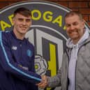 Harrogate Town's newest recruit, Tom Cursons, is welcomed by manager Simon Weaver after joining the League Two outfit from non-league Ilkeston. Picture: Harrogate Town AFC