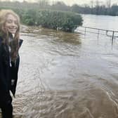 Pictured: Imogen Otley, 10, is wading to school in Ripon in her wellies.