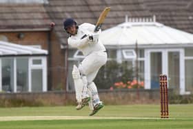 Ben Holderness hit a defiant half-century for Beckwithshaw CC. Picture: Gerard Binks