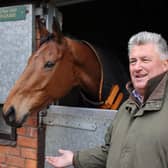Bravemansgame, left, with trainer Paul Nicholls. Picture: Adrian Dennis/Getty Images