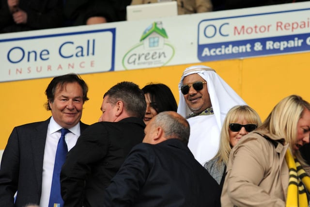 Mr Mansour Cin Hamad Al Stagni takes in Mansfield Town v Exeter with John Radford.
