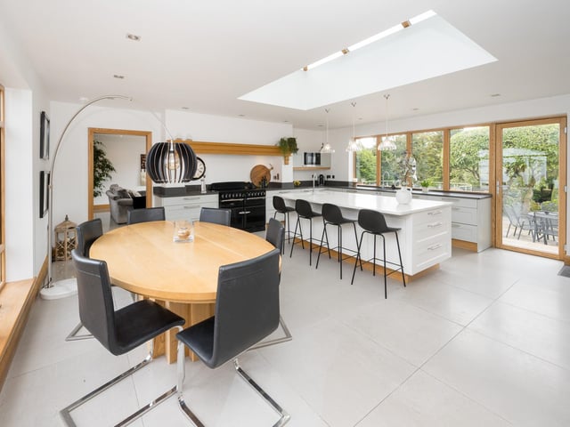 A bright and spacious kitchen with diner.