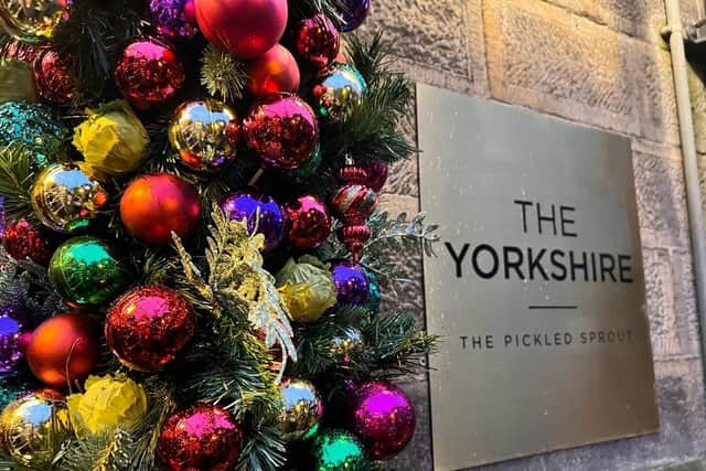 The stunning festive floral display which has been put up outside The Yorkshire Hotel and Pickled Sprout in Harrogate. If you look closely, you can even see the fake sprouts which have been included to honour the Pickled Sprout.