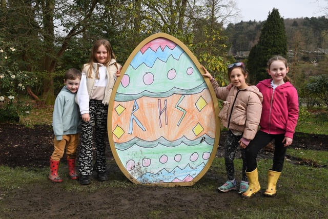 Three-year-old George Walker, nine-year-old Aubrey Ezard, six-year-old Edia Ezard and six-year-old Mary Walker with one of the giant eggs