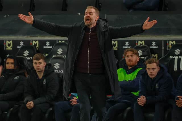 Sulphurites boss Simon Weaver watches on at Stadium MK.