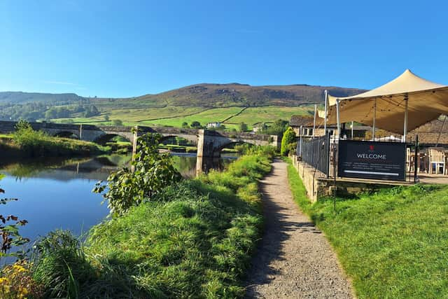 Welcome to Burnsall Red Lion ''alefresco'' terrace, affording intoxicating water views for post-walk pint.