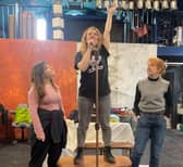 Claire O’Connor, Stacey Sampson, and Victoria Brazier play 3-sisters Isabel, Mary and Olive thrown into the Miners’ strike as Women Against Pit Closures in We’re Not Going Back.. Credit: Red Ladder Theatre Company