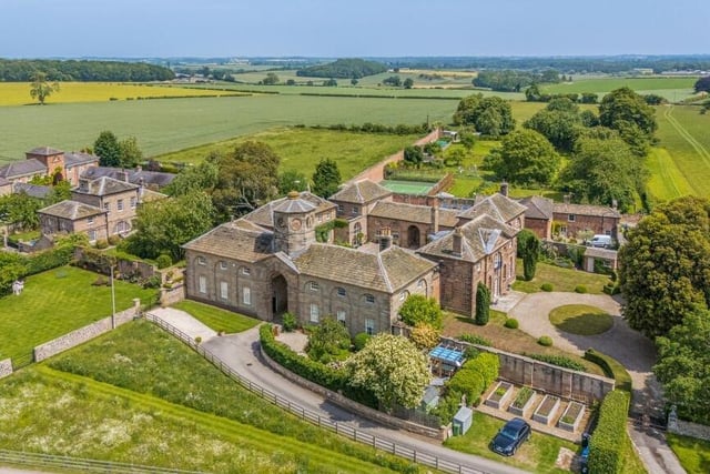 An aerial view of the property within a private residential estate.