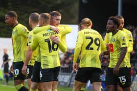 Harrogate Town's players celebrate after taking an early lead during their recent 3-0 win over Mansfield. Pictures: Matt Kirkham