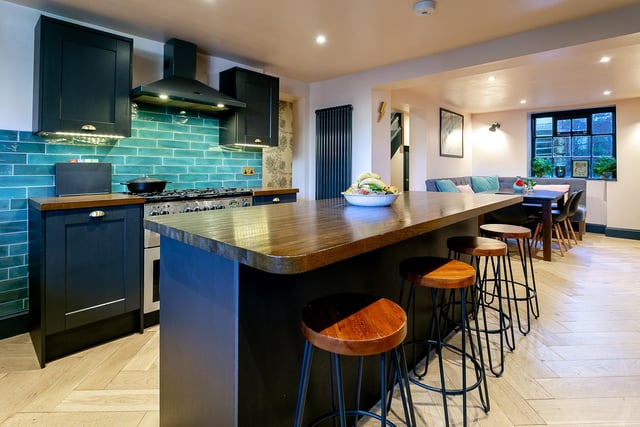 An alternative view of the attractive living and dining kitchen.