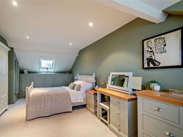 An upper floor double bedroom has plenty of space.
