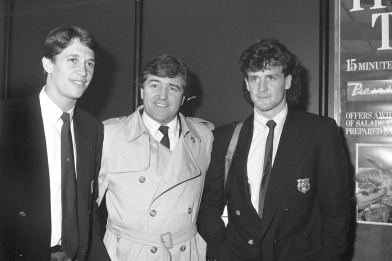 Barcelona FC manager Terry Venables ('El Tel') with two of his players Gary Lineker (left) and Mark Hughes (right) arrives at Edinburgh airport in March 1987.