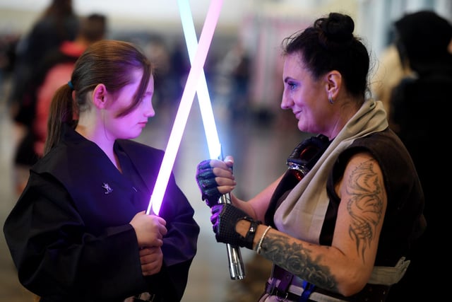 Visitors to Comic Con Yorkshire enjoying some Lightsaber training