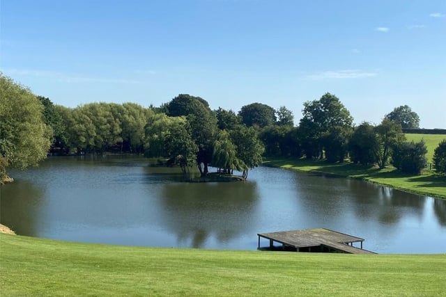 The gardens lead down to this lovely lake.
