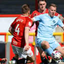 Bryn Morris in action during Harrogate Town's 2-1 victory at Morecambe on the final day of the 2024/25 season. Pictures: Matt Kirkham