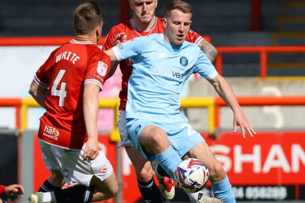 Bryn Morris in action during Harrogate Town's 2-1 victory at Morecambe on the final day of the 2024/25 season. Pictures: Matt Kirkham
