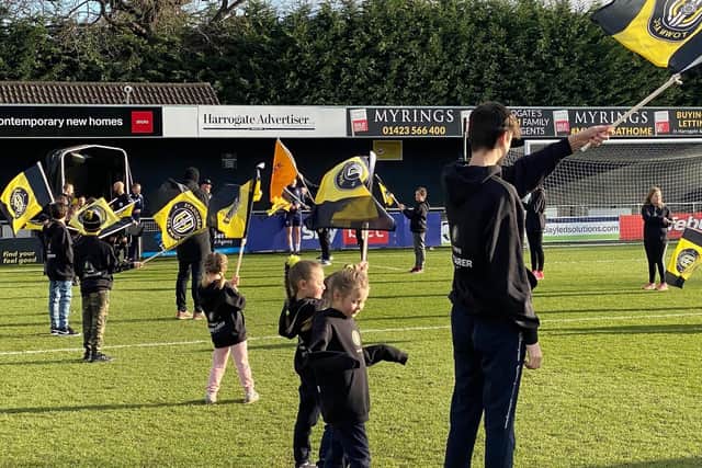 Harrogate Town's last home match against Stockport County saw 19 children of EnviroVent staff take part in a Flag Bearer’s Event with players before kick off and a half time penalty shoot-out.
