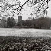 Christ Church in Harrogate as snow showers fall this morning.