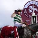 British jockey Luke Morris celebrates while riding Alpinista after winning in The Prix de l'Arc de Triomphe horse race at The Paris Longchamp racecourse. Picture: Getty Images