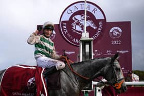 British jockey Luke Morris celebrates while riding Alpinista after winning in The Prix de l'Arc de Triomphe horse race at The Paris Longchamp racecourse. Picture: Getty Images