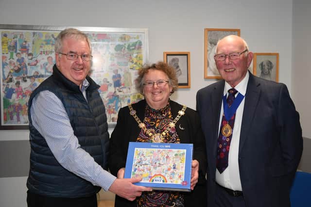 Unveiling of NHS tribute - John Fox, Chairman of the Friends of Harrogate Hospital, with the Mayor and Deputy Mayor of Harrogate Borough Council, Coun Victoria Oldham and Coun  Robert Windass. (Picture Gerard Binks)