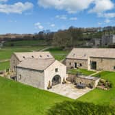 The development in its picturesque location within walking distance of village amenities.