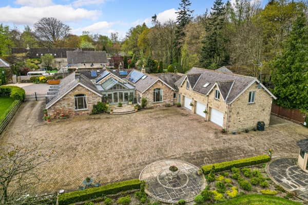 Looking over the Nidd property with its triple garage.