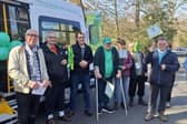 Harrogate and Knaresborough MP Tom Gordon joins trustees, volunteers and members of Open  Country at the launch of the charity’s new electric minibus. (Picture contributed)