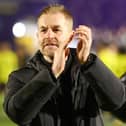 Harrogate Town manager Simon Weaver applauds his team's supporters following Friday evening's FA Cup win over Gainsborough Trinity. Pictures: Matt Kirkham