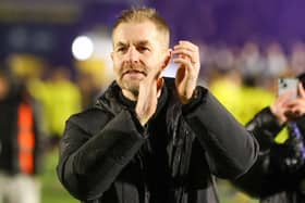 Harrogate Town manager Simon Weaver applauds his team's supporters following Friday evening's FA Cup win over Gainsborough Trinity. Pictures: Matt Kirkham