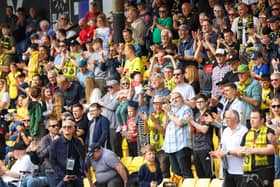 Harrogate Town supporters inside the EnviroVent Stadium. Pictures: Matt Kirkham