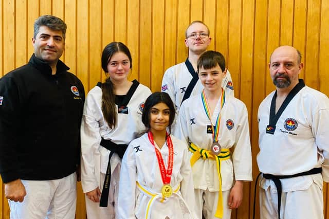 Master Kambiz R Ali, left, with members of his team from Harrogate’s KR Ali Taekwondo Academy. Picture: Submitted
