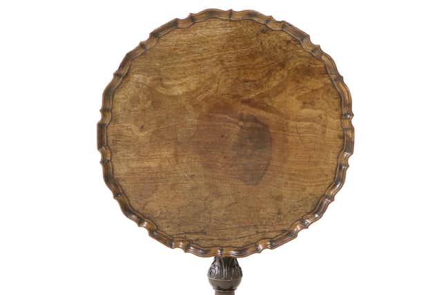 Top of a George II Carved Mahogany Tripod Table, mid 18th century, that sold for £8,000