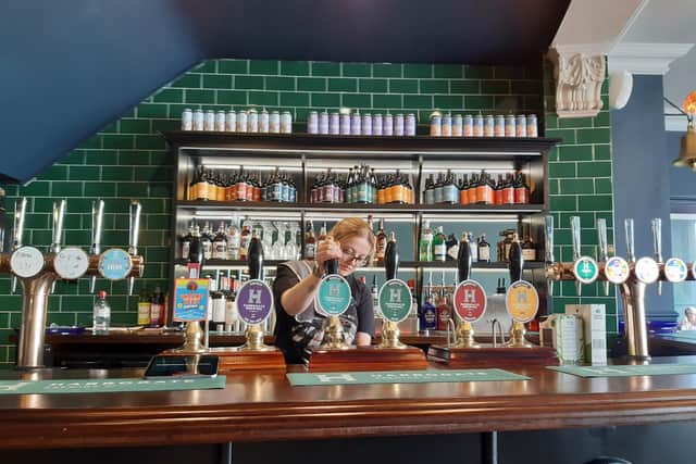 Manager Andi behind the bar at Harrogate Brewing Co after its launch at the historic site in Harrogate which was formerly The Old Bell Tavern. (Picture Graham Chalmers)