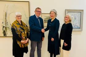 Let there be light - The Friends of The Mercer group's deputy chair Julie Goldsmith, chair Tom King with May Catt, senior manager who is creative and cultural hubs at North Yorkshire Council, and Karen Southworth, exhibitions curator at the Harrogate gallery. (Picture contributed)