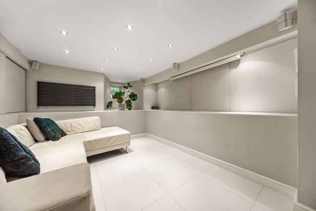 This comfort zone forms part of the open plan living kitchen and doubles as a cinema room.