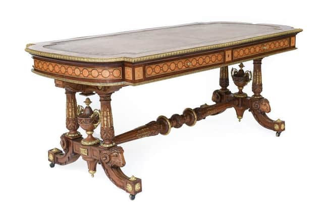 A Fine Victorian Burr Walnut, Marquetry-Inlaid and Gilt Metal Mounted Library Table attributed
to Holland & Sons – estimate: £2,500-3,500