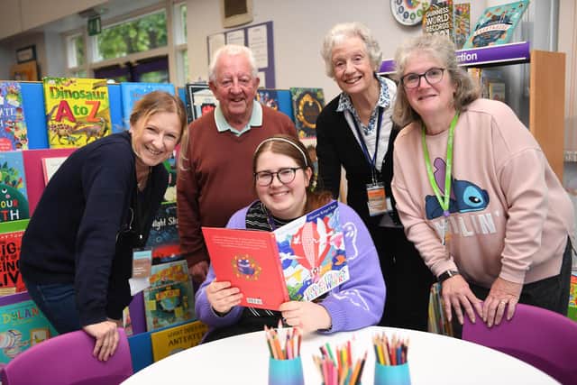Celebrating a job well done - Volunteers at the new children's area at Starbeck Library including Peter Davies, Donna Birstow,  Abby Pullen, Sheila Broon and Ann Lewsley. (Picture Gerard Binks)