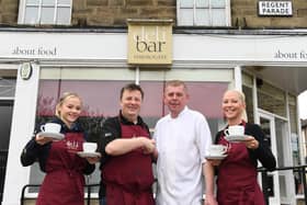 End of one era, beginning of a new one - The Harrogate Deli Bar cafe's new owner Jason Evans, second from left, with old owner Darren Winder, second from right, flanked by staff members Hayley Francis, right, and Sienna Francis, left. (Picture Gerard Binks)
