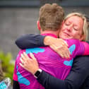 Harrogate man Simon Gregory hugs his late Aunty Ruth's nurse, Mairead, after cycling 288 miles in a sub-24-hour time for Macmillan Cancer Support.