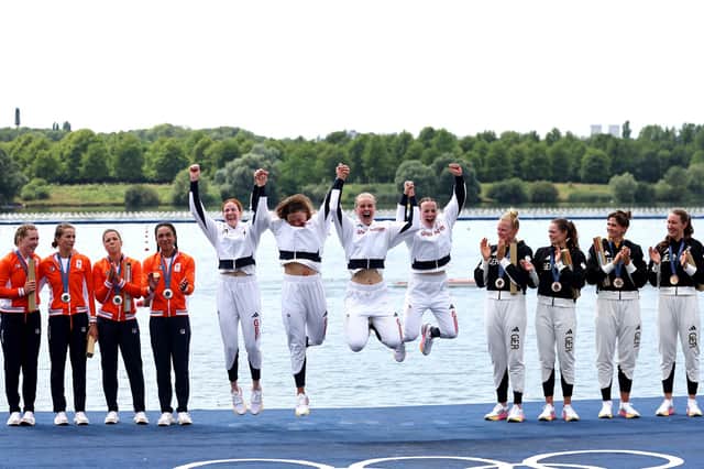 Gold medalists Lauren Henry, Hannah Scott, Lola Anderson and Georgina Brayshaw of Team Great Britain celebrate at the Rowing Women's Quadruple Sculls medal ceremony on day five of the Olympic Games Paris 2024. Picture: Francois Nel/Getty Images