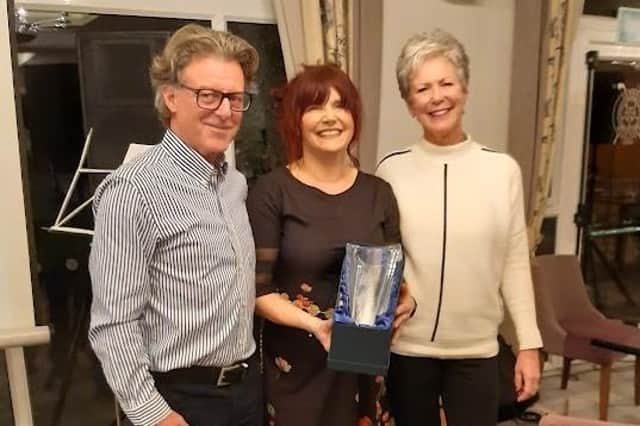 Jaine Collington, centre, Pannal GC's front of house manager, receives a commemorative gift from club captains Lindsay Mckenzie and Ann Mcdonough. Picture: Submitted