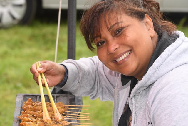 Suzy Jenkinson, of Kuala Lumpur Café, cooking her chicken satay at the festival