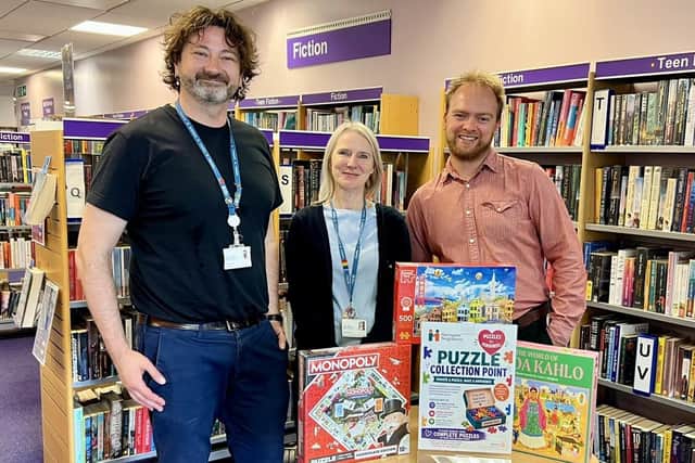 Puzzles may be the solution - From left, Greg Kubas, Knaresborough Library community development librarian, Maria, library supervisor, Jamie Nicholson-Ruther, development and communications manager at Harrogate Neighbours. (Picture contributed)