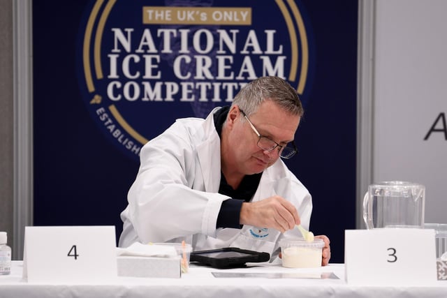 The judges taste testing the ice cream in the National Ice Cream Competition at the show