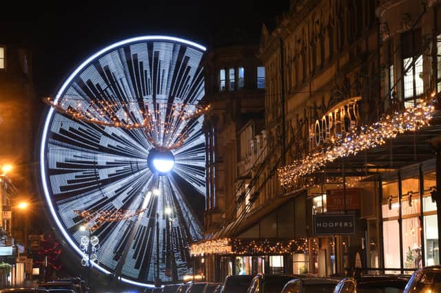 Harrogate Christmas Fayre has been accompanied by a giant London Eye style ferris wheel in the town centre. (Picture Gerard Binks)