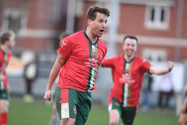 Harrogate Railway defender Mike Morris can't hide his delight after netting a 99th-minute equaliser against Brigg Town. Pictures: Gerard Binks
