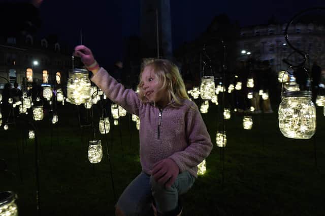 Five-year-old Luna Busfield from Harrogate enjoying the field of light at the War Memorial during the Beam Festival which was produced by Harrogate International Festivals and supported by the Festival’s Future 50 fund, North Yorkshire Council, Visit North Yorkshire and Harrogate BID. (Picture Gerard Binks)