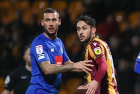 Harrogate Town's Joe Mattock prepares to attack a set-piece during Thursday evening's League Two loss at Bradford City. Picture: Matt Kirkham